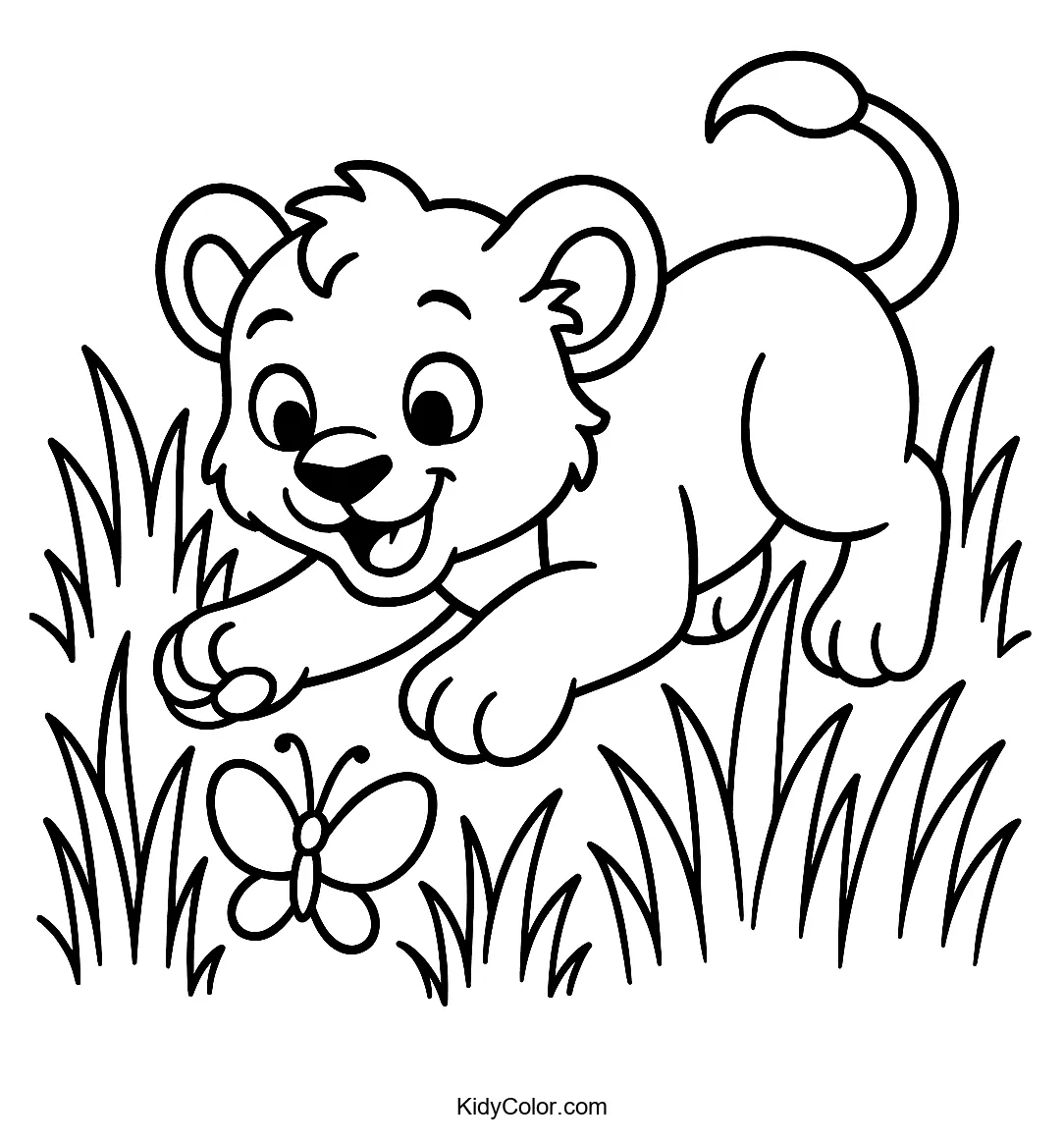 Lion cub pouncing on a butterfly