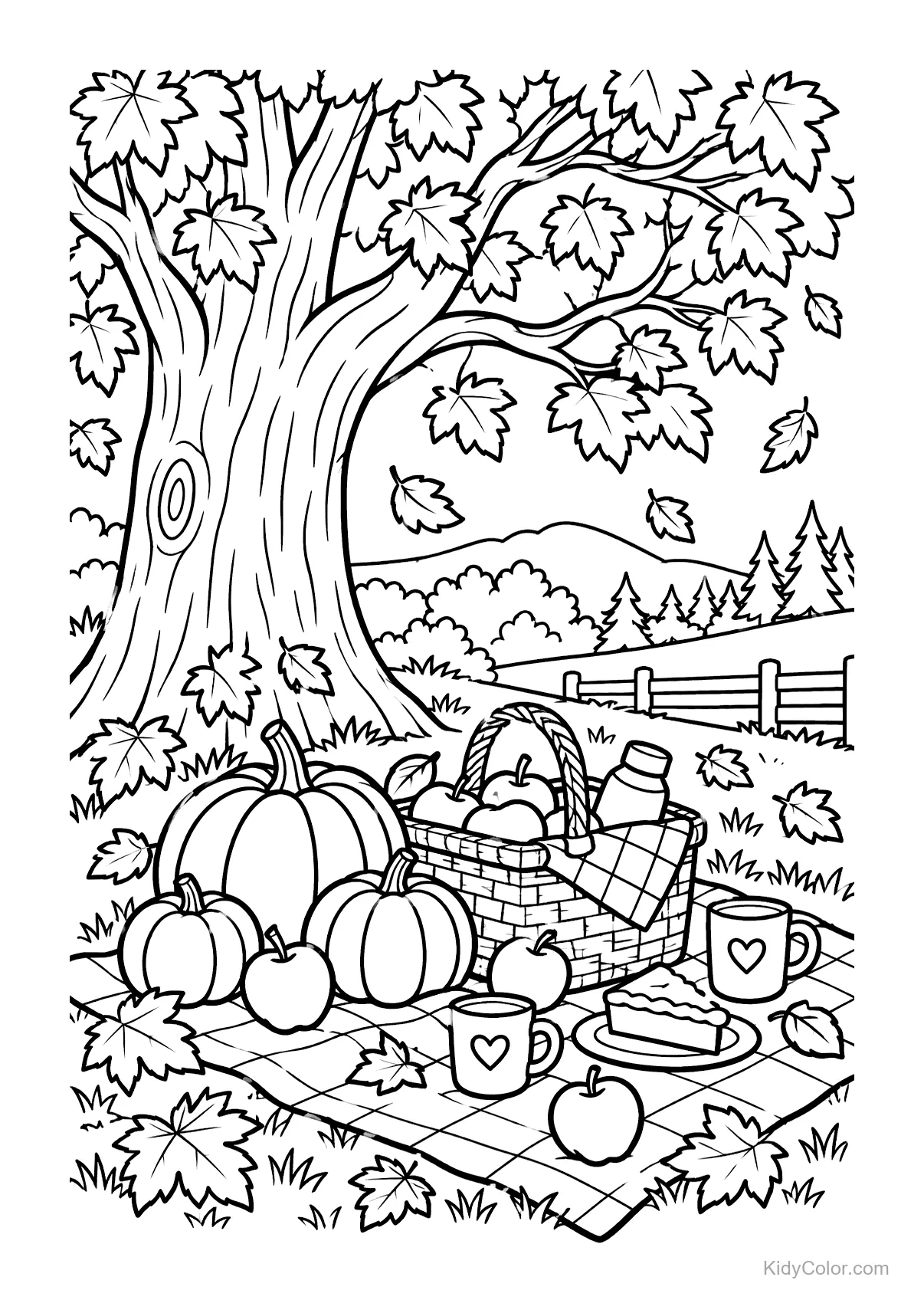 Autumn picnic setup with pumpkins and picnic basket under a tree.