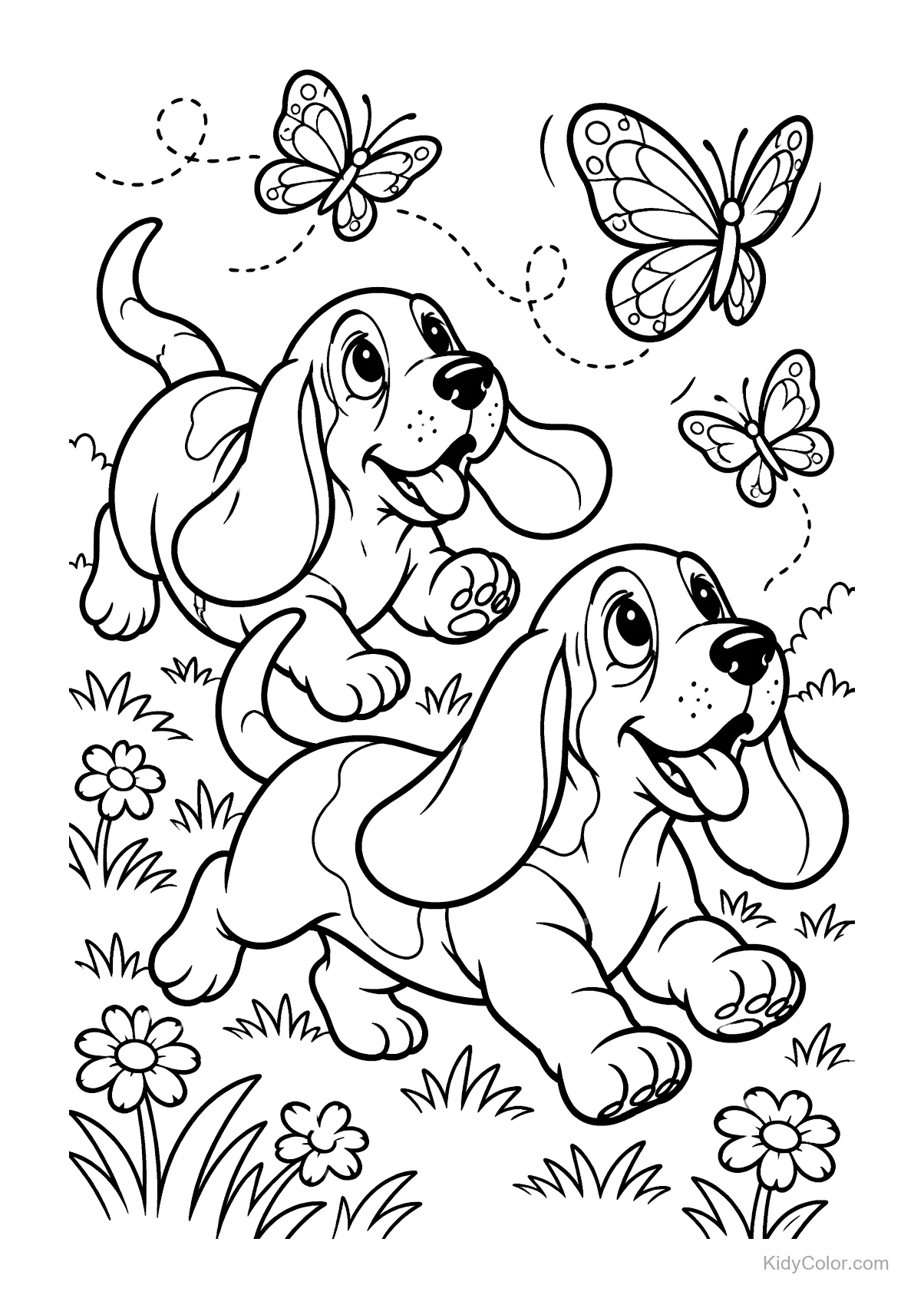Basset puppies chasing butterflies in a grassy field.