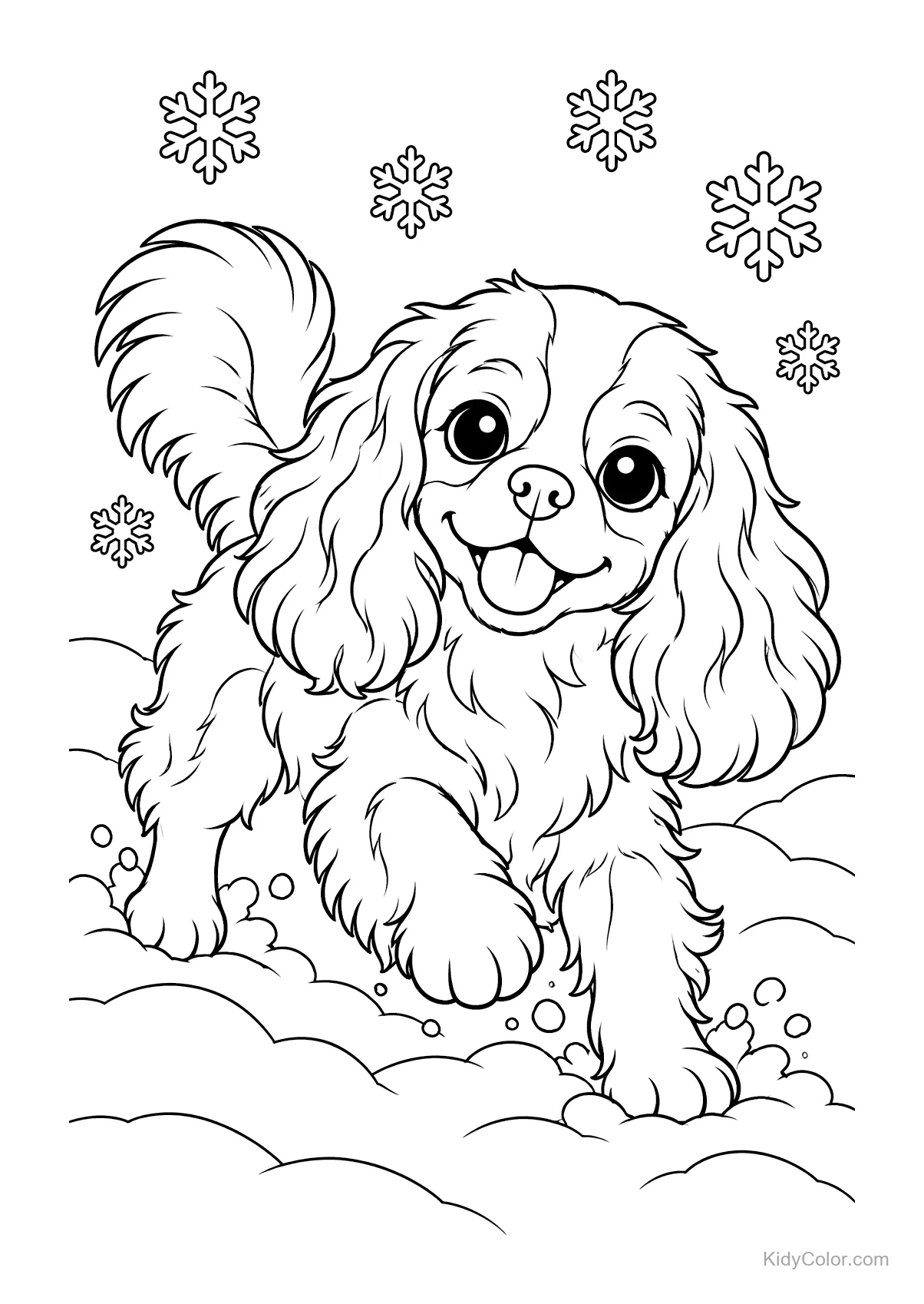 Cavalier King Charles Spaniel speelt in de sneeuw met sneeuwvlokken.
