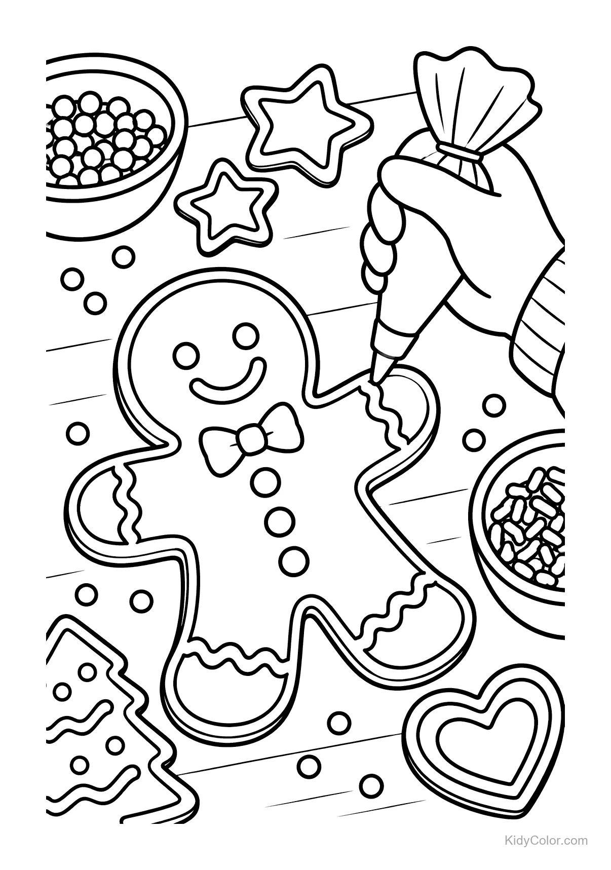 Mão decora biscoito de gengibre sorridente com glacê.