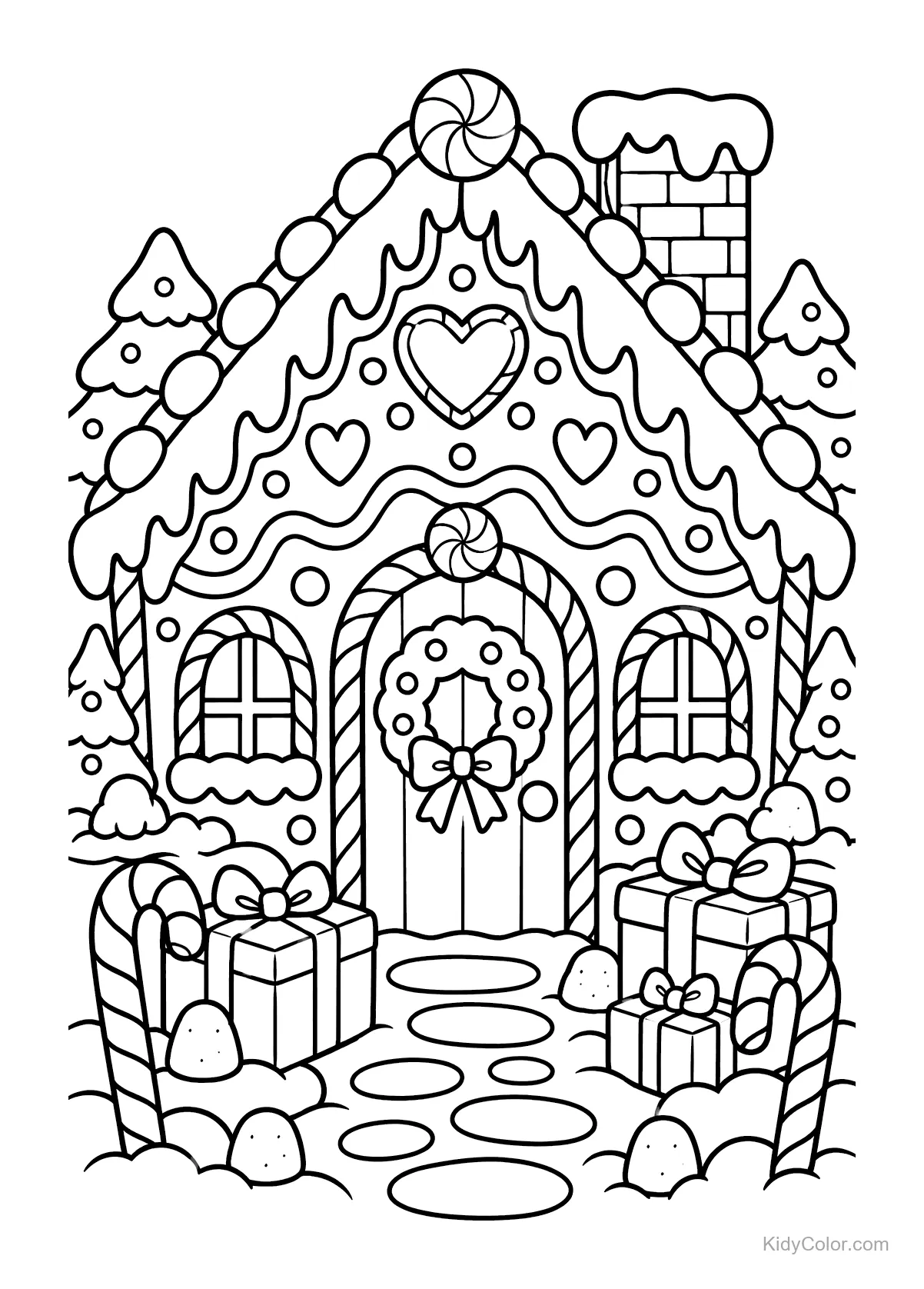 A gingerbread house decorated with candy and surrounded by gifts and trees.