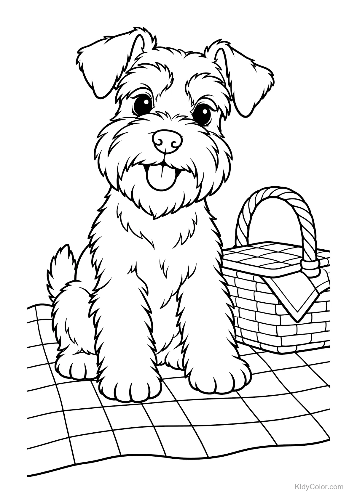Schnauzer nain assis sur une couverture avec un panier de pique-nique.