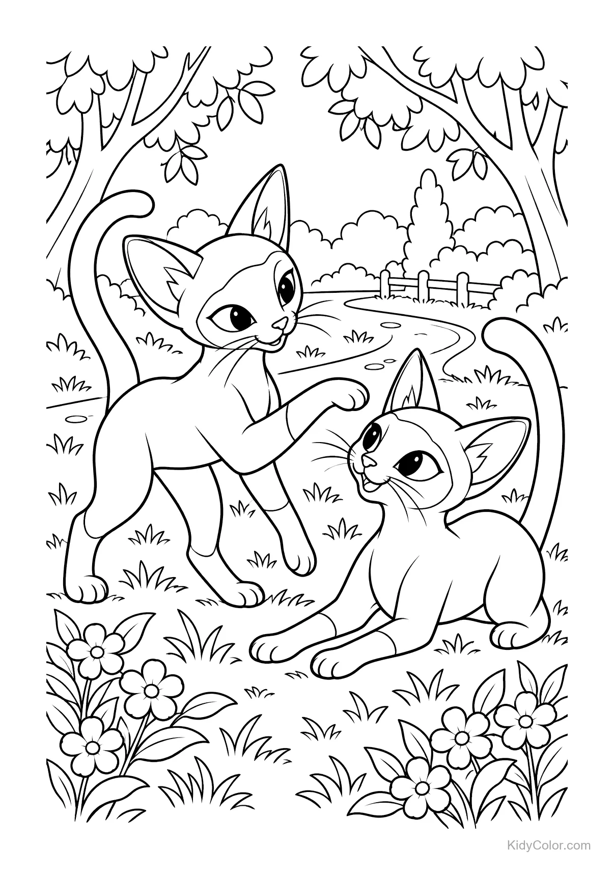 Two playful Siamese cats in a park with trees and flowers.