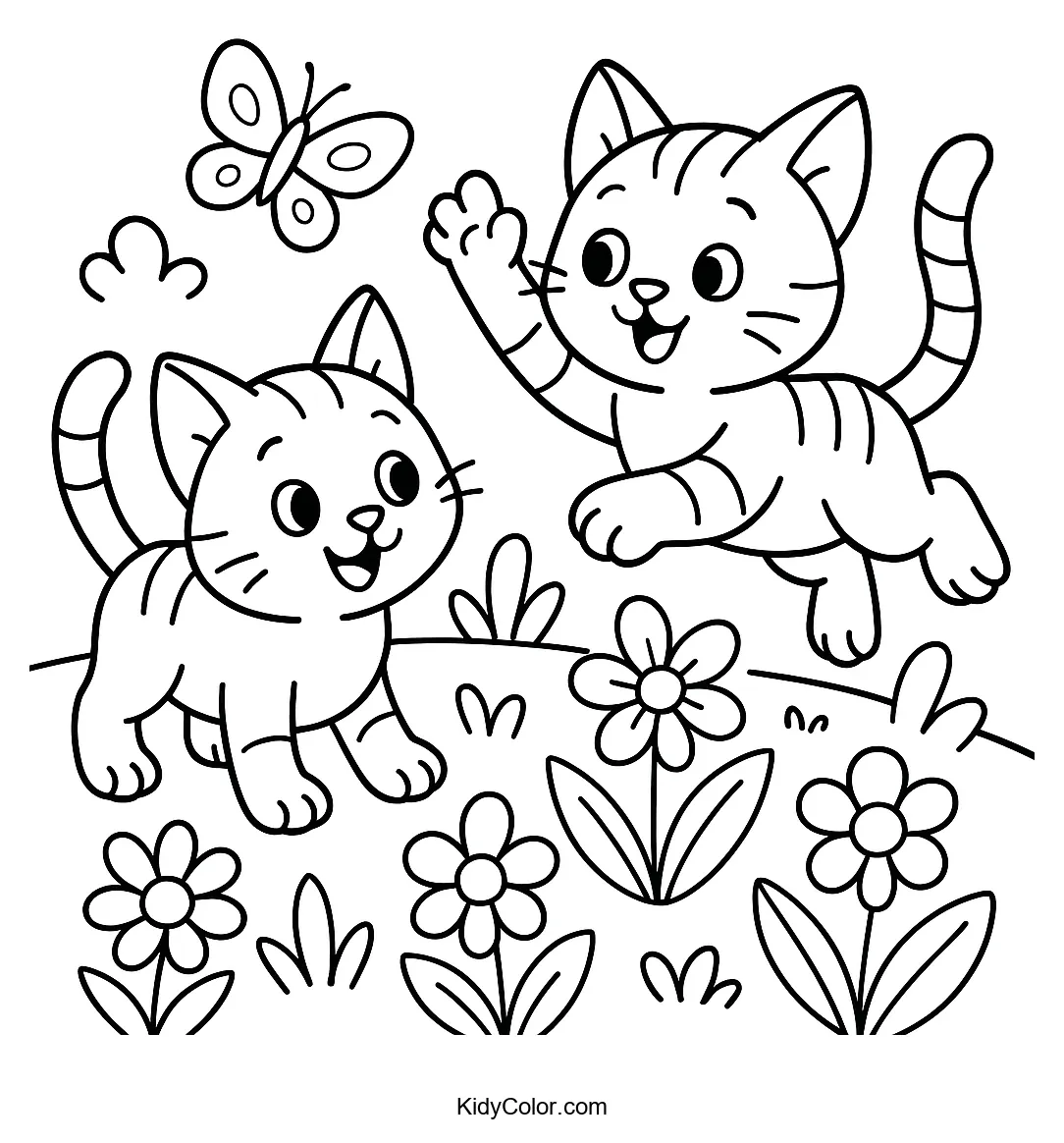 Kittens chasing butterflies in garden